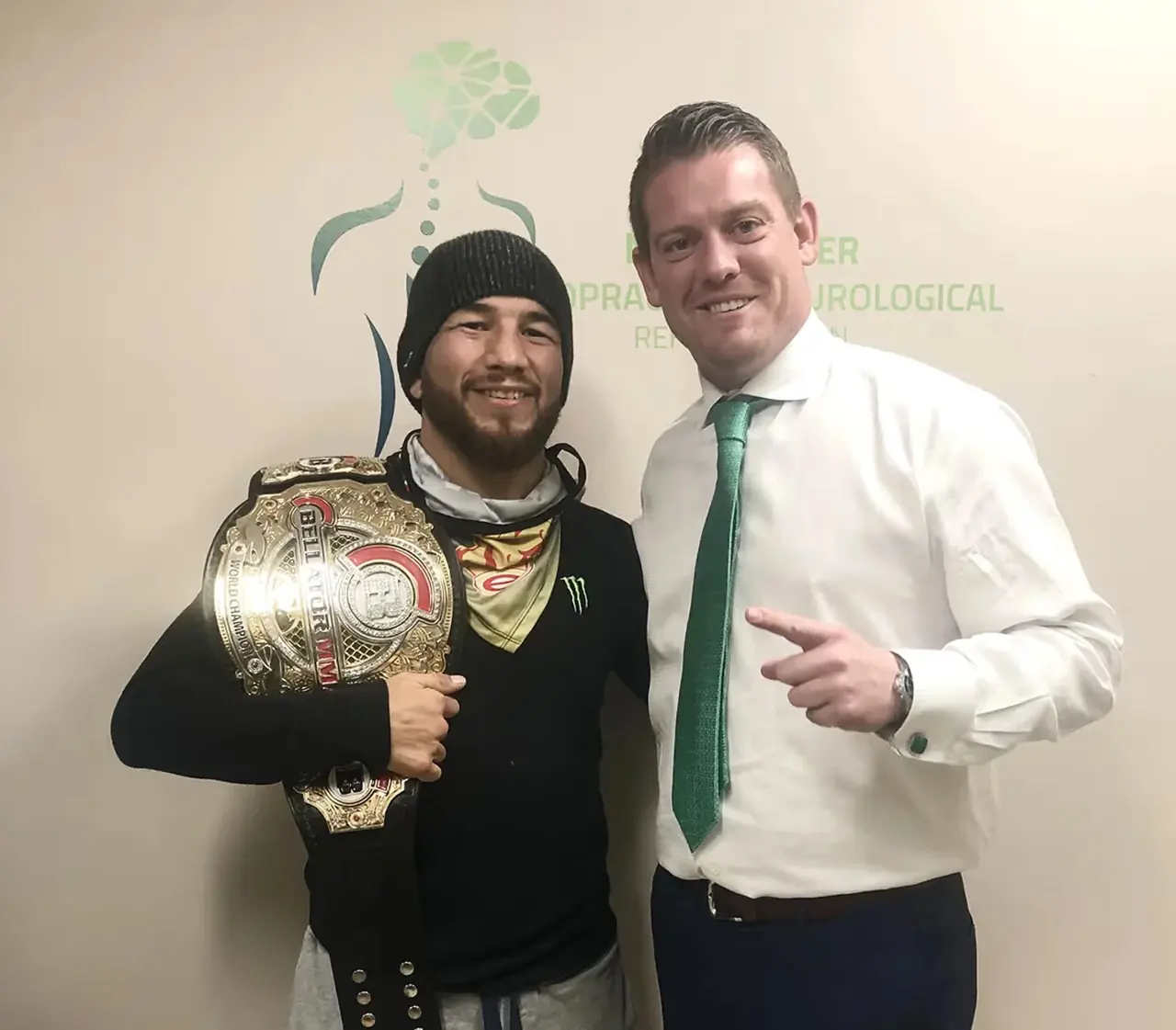 Juan Archuleta with Dr. Jeff McWhorter Juan Archuleta holding a championship belt beside Dr. Jeff McWhorter